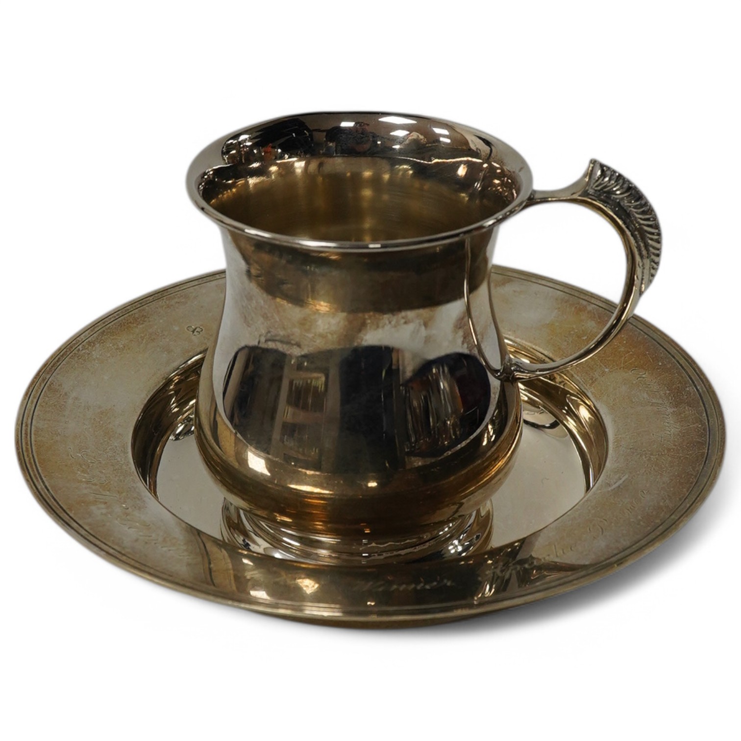 A modern silver Armada dish, London, 1990, 14.7cm and a modern silver baluster christening mug, 9.3oz. Condition - fair to good